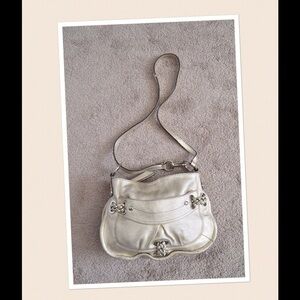 B. Makowsky leather satchel